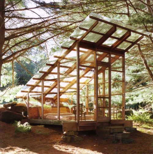 Photo of a stand alone porch in a forest